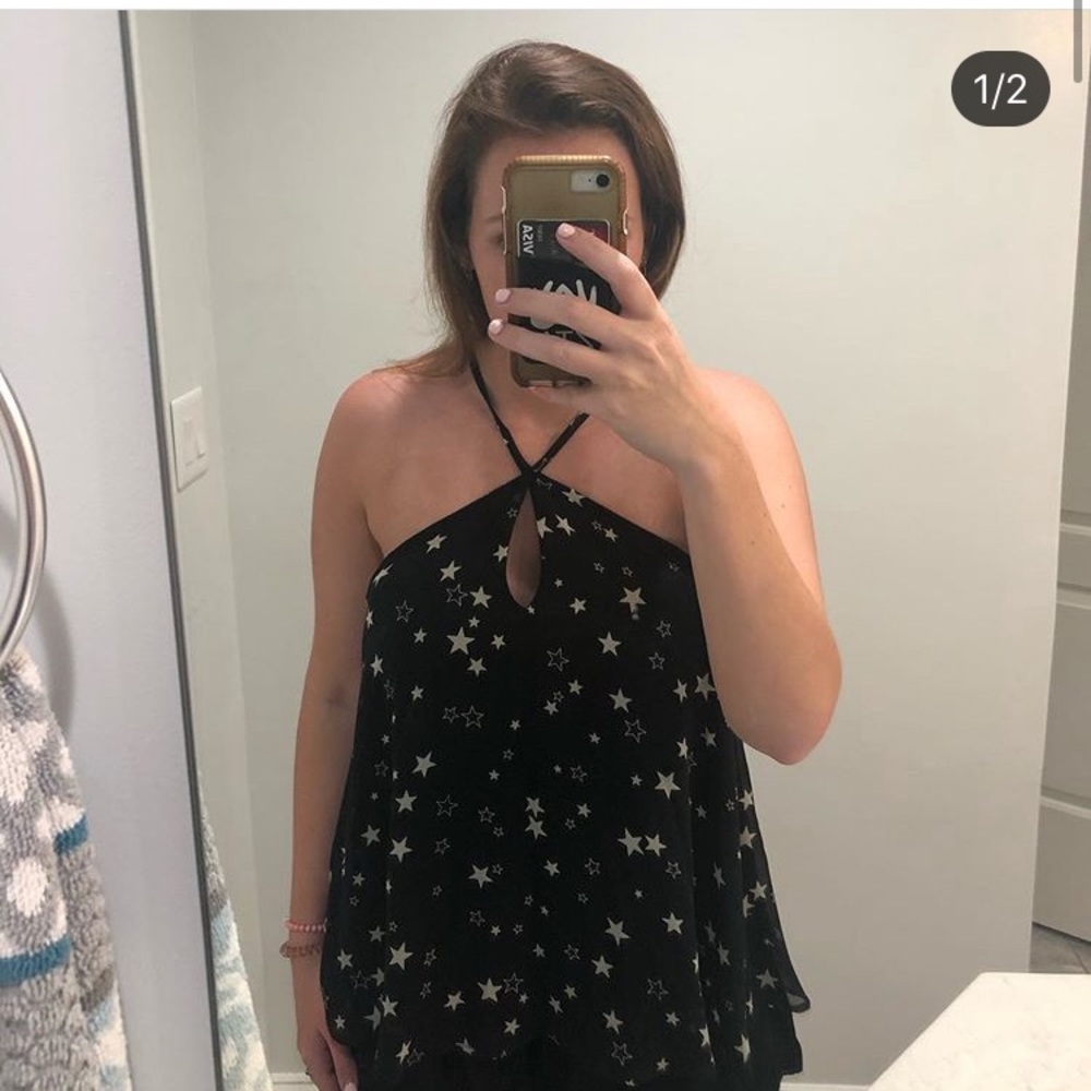 Black flowy star top